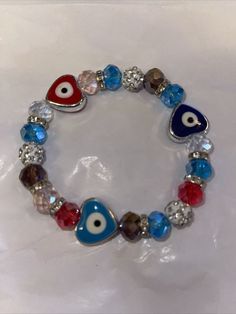 Charm Evil eye Bead protection Good Luck Bracelet Elastic￼. * ALL CLOTHING AND FABRIC ITEMS  HAVE BEEN STEAMED CLEANED AND / OR WASHED / LAUNDERED TO EBAYS STANDARDS Good Luck Bracelet, Good Luck, Bracelets And Charms, Evil Eye, Fashion Watches, Elastic, Jewelry Watches, Jewelry Bracelets, Fashion Jewelry