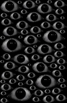 black and white photograph of many eyes in the dark, with only one eye visible