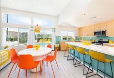 yellow, orange & aqua accents a bright tall-ceiling palm springd midcentury style space full of light. The natural light reflects of the lush glass subway tile in breaker. This tile is perfect for indoor & ordoor spaces, kitchens, bathrooms, pools & feature area Modern Tile Backsplash, Colorful Midcentury, Contemporary Tile, Unique Tile