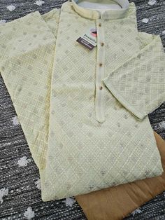 **Visit our store for full collection: https://www.etsy.com/shop/DesiGiftsUSA ** * Crafted for outstanding comfort & special moment with Superior Quality  * Premium quality heavy Chikankari Georgette kurta pajama with Sequence for exclusive occasions. * Used for Indian. Asian festival and other auspicious occasions such as Diwali, Eid, Ramadan, Housewarming, Birthday, Pooja * Ready to Wear * Kurta color : Pista Green Shade with cotton linen * Pajama color : Beige color churidaar pajama * Fabric : Chikankari embroidery Georgette * Design Man# 1215 Disclaimer: Actual color of the dress may slightly vary due to the screen resolution. Refer the size chart for measurements given in the listing with pictures. We are happy to help. **For details on Store policy including return & Exchange, please Asian Festival, Georgette Kurta, Chikankari Embroidery, Pista Green, Eid Ramadan, Linen Pajamas, Kurta Pajama, Beige Color, Shades Of Green