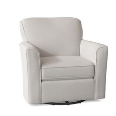 the swivel chair is upholstered with an armrest and foot rest