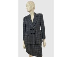 Beautiful vintage 80s Runway Vintage Moschino Cheap and Chic Plaid Skirt Suit (Blazer & Skirt) with wonderful buttons. Made in Italy. Material: wool. Condition: Mint vintage condition. Measurements (taken with the garment lying flat, from seam to seam): Size : Marked IT 46/FR 42/GB 14/ US 12, but please check measurements for more detail before purchase I'm unfortunately cannot accept returns due to the item not fitting right. Blazer Measurements Length: 27.55 inches Shoulder Width: 5.51 inches 80s Runway, Runway Vintage, Vintage Moschino, Womens Suits, Moschino Cheap And Chic, Blazer And Skirt, Plaid Skirt, Plaid Skirts, Skirt Suit