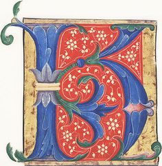 an illuminated initial decorated with flowers and leaves