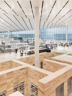 the interior of a large library with lots of bookshelves