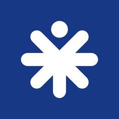 a blue and white sign with an arrow pointing to the center