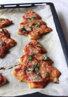 small pieces of pizza on a baking sheet