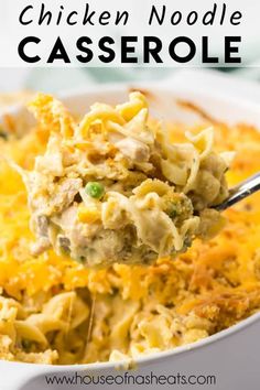 chicken noodle casserole in a white dish with a spoon full of the casserole