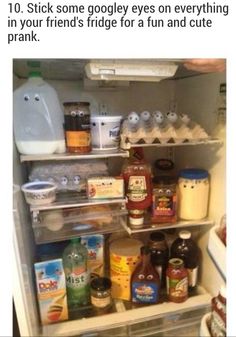 an open refrigerator filled with lots of food and condiments on the bottom shelf