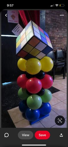 a rubik cube tower made out of balloons