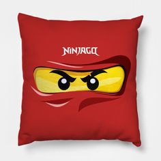 a red pillow with an image of a yellow banana in the middle and words ninja on it