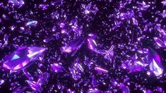 purple crystals are scattered around in the dark