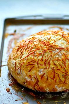 a baked pastry sitting on top of a pan