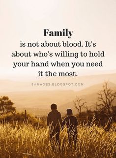 two people standing in tall grass with the words family is not about blood it's about