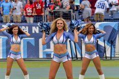 the cheerleaders are performing on the field