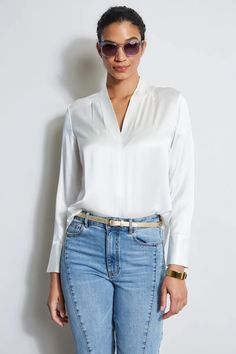 Silk Satin Contour Neck Shirt – Elie Tahari Versatile V-neck Workwear Shirt, Versatile V-neck Work Shirt, Classic V-neck Blouse With Relaxed Fit, Classic V-neck Relaxed Fit Blouse, Elegant White V-neck Top For Work, Elegant V-neck Blouse With Relaxed Fit, Elegant Split Neck Office Blouse, Elegant Formal V-neck Top, Elegant Top With Split Neck In Solid Color