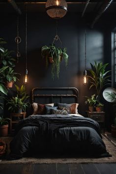 a bedroom with black walls and plants hanging from the ceiling, along with a bed