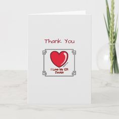 a thank you card with a red heart