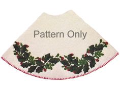 a white towel with holly leaves on it and the words pattern only written in red