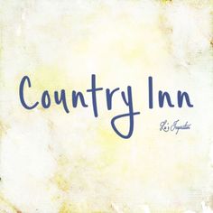 the words country inn are written in blue ink on an old, stained paper background