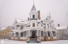 a large white house covered in snow