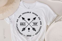 a white t - shirt with the words we are trouble when we are girls trip