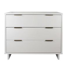 a white dresser with two drawers on it