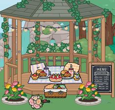 a picnic table with food on it in front of a wooden gazebo and flowers