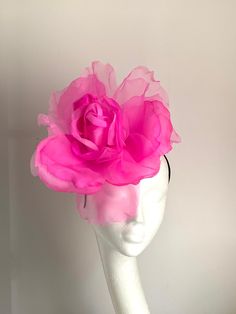 Large hot pink flower hat This amazing large hot pink flower hat is made from organza and velvet fabric. The hat sits on the black fabric-covered headband to which I attached a comb so it will sit steadily on your hair. A large hot pink flower hat will be an amazing accessory to compliment your outfit. It will fit the average head size. You can wear this amazing hat at the wedding, Christening, Horse races, and any other special occasion. Enjoy and please have a look in my shop for more hats and Pink Fascinator With Handmade Flowers For Races, Pink Flower Fascinator For Wedding, Pink Flower Headpiece For Kentucky Derby, Pink Fascinator With Handmade Flowers For Royal Ascot, Pink Handmade Flowers Fascinator For Royal Ascot, Pink Fascinator With Handmade Flowers For Evening, Pink Flower Fascinator For Kentucky Derby, Pink Evening Fascinator With Handmade Flowers, Pink Hat For Spring Events