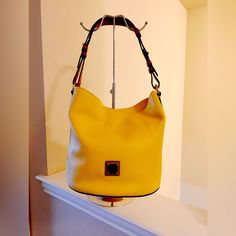 This Full Size, Sunny Yellow Set Is New With Tags. Comes With Dust Bag And Authenticity Paperwork. Smoke Free Environment. A Great Bag For Your Summer Fun! Yellow Bucket Bag With Gold-tone Hardware, Dooney And Burke, Jean Purses, Feed Bags, Hobo Purse, Ostrich Leather, Sunny Yellow, Leather Hobo Bag, Dooney & Bourke Bags