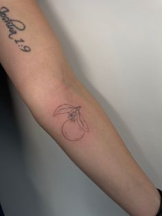 a person with a tattoo on their arm