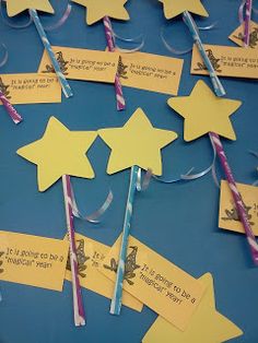 some little yellow stars are on sticks with name tags