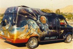 an old van painted with the image of jesus on it