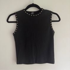 Vintage 90's Black Sleeveless Cropped Tank With Silver Round Studs Around The Neckline And Arm Holes. Looks Brand New, No Fading To Color, Lots Of Stretch, Super Cute Top. Made In The Usa. 90% Cotton/10% Lyrcra Pit To Pit: 14" Waist: 13" Sleeve Length: Length: 18.5" Size Label: Medium Best Fit: Small-Medium Depending On Desired Fit Brand: Styles 90s Style Sleeveless Stretch Crop Top, 90s Style Fitted Sleeveless Crop Top, Fitted Sleeveless 90s Crop Top, Fitted 90s Tank Crop Top, Y2k Tank Top For Night Out, Cropped Vest Top For Night Out, Black 90s Style Tank Top, Fitted Sleeveless 90s Tops, Casual Tank Vest For Night Out