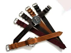 1pc. NATO ® Liberator ™ Bomber WWII Leather Watch band strap Unique 1 Spring Bar design, which will adapt to any size watch case. Comes in a array of different colors...ALL seams are Stitched....Stainless Steel Buckle...250mm Long...Stitched in place Leather keepers...1.5mm Thick ...same Italian soft Leather on top and bottom....This Leather is a Distressed type leather, which accounts for differences in color shades. Due to the unique grain of the leather, colors will vary according to each strap.. Raf Pilot, Leather Colors, Nato Strap, Leather Watch Band, Leather Watch Bands, Distressed Leather, Watch Case, Bar Design, Wrist Watches