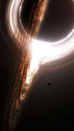 an image of a black hole in the sky with light coming from it's center