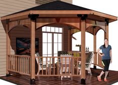 a woman standing in front of a wooden gazebo on top of a brick patio