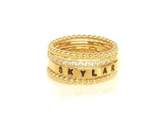 This set of Gold Stacking Rings is Gorgeous & amazing quality. It can be personalized with a name or a date on the hand stamped ring. This comes in sizes 6-9 and is sure to be your favorite in design & personal meaning! This set includes: 2-    2mm Gold bead rings- $40.00 1-    personalized 3mm hand stamped ring- $26 1-    crystal ring- $20 Total  $86.00 If you would like to create your own stack of rings please visit my ring section and you can design your own. Just add each one to your cart in Gold Name Ring, Gold Stackable Rings, Stackable Name Rings, Gold Stacking Rings, Mother's Ring, Bead Rings, Stamped Ring, Hand Stamped Ring, Gold Stacking Ring