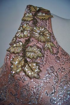 "Wowzers! This vintage 1950s Ann's vogue Shoppe gown is a stunner! It is a full length pink and silver brocade gown with sequin and beaded appliqué on the shoulder. It zips up the back (the original zipper has been replaced) and has a bow at the lower back. It is fully lined in pink acetate and is in excellent condition but does have areas of discoloration in skirt folds and under the arms. Size: M Bust: 34\" Waist: 29\" Hips:Open Length: 52\"" Pink Evening Gown For Festive Occasions, Festive Pink Evening Dress For Gala, Glamorous Pink Embellished Mother Of The Bride Dress, Glamorous Pink Mother Of The Bride Dress, Festive Pink Prom Gown, Festive Pink Sequined Evening Dress, Glamorous Pink Floor-length Mother Of The Bride Dress, Vintage Pink Evening Dress For Wedding, Formal Pink Sequined Mother Of The Bride Dress