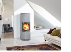 a modern stove in the middle of a living room