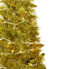 a close up of a christmas tree with lights on it's branches and tinsel