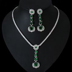 Experience the charm of the Cubic Zirconia Necklace and Earring Party Jewelry Set, perfect for pageants and parties. The sparkling cubic zirconia stones and the matching necklace and earrings design make it a standout piece for your attire. Elevate your style and make a statement with this fashionable and timeless jewelry set.
– This bridal several cubic zirconia gemstone necklace set is perfect for adding elegance to any bridal ensemble. – Made with high-quality materials, this set includes a Party Jewelry Sets In Diamond White Cubic Zirconia, Party Jewelry Sets With Rhinestones And Cubic Zirconia, Diamond White Hand-set Jewelry Sets For Party, Hand Set Diamond White Jewelry Sets For Party, Fine Jewelry Sets With Cubic Zirconia For Party, Fine Jewelry Sets With Sparkling Stones For Party, Elegant Green Jewelry Sets With Rhinestones, Party Jewelry Sets With Diamond Accents In Diamond White, Elegant Green Rhinestone Jewelry Sets