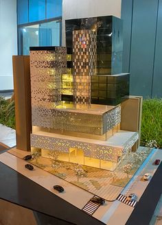 a model of a building is on display