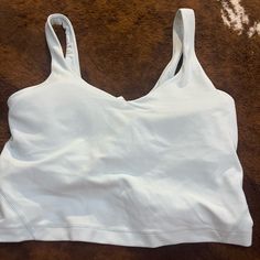 Just Been Sitting In My Dresser, Bought This And Have Never Worn It. Athleisure Tops With Built-in Bra For Relaxation, Relaxation Tops With Built-in Bra And Medium Support, Sporty Tops With Built-in Bra For Relaxation, White Athleisure Tops For Relaxation, Tops With Built-in Bra For Relaxation, Medium Support Tops With Built-in Bra For Relaxation, Solid Color Tops For Light Exercise, Bra Friendly, Bra-friendly Tops For Light Exercise, Sporty Sleeveless Tops For Relaxation