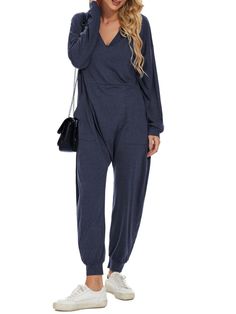 When it comes to being comfortable, light and beautiful, Jumpsuits are the ideal garment for that relaxed and cool style that you want to project. It is versatile, easy and quick to combine, it stylizes the body and can be used by any woman of any age. This practical black jumpsuit is perfect for you, it will give you a unique casual style. Pockets on sides. Buttons down front closure. Pockets on front. Long sleeves. Deep V-neckline 30% cotton, 65% polyester, 5% spandex. Color may be lighter or darker depending of the device it is displayed. High Heel Wedges Platform, Beautiful Jumpsuits, Loose Jumpsuit, Romper And Jacket, Wide Pants, Sweater Pants, Black Jumpsuit, Dress With Boots, Flare Pants