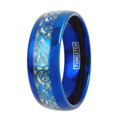 Exquisite polished royal blue tungsten dome ring with a dashing royal blue Celtic Dragon against a glow in the dark background inlay. These rings work best after being exposed to sunlight for at least 30 minutes. The glow and luminescence is much stronger after being activated by the rays. Beautiful modern ring in tungsten. Perfect for casual wear or even special occasions. Superior Quality Tungsten Ring - Guaranteed Genuine Tungsten. Comfort Fit - Slightly domed on the inside of the band for a Glow In The Dark Background, Blue Tungsten Ring, Celtic Dragon, Dome Ring, Modern Ring, Tungsten Ring, Domed Ring, Dark Background, Green Day