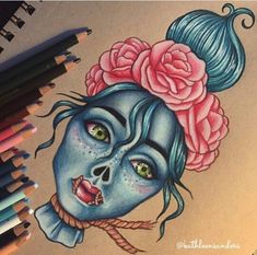 a drawing of a woman's face with flowers in her hair and blue skin