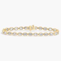 Timelessly luxurious and elegant, this classic tennis bracelet features 10 ct. tw. of diamonds shimmering along its length. The oval-cut stones are beautifully held in bezel settings in the lustrous 14k yellow gold design. Pearl Jewelry Gift, Pearl Bracelet Gold, Platinum Rose Gold, Gold Rings Fashion, Gold Pearl Necklace, Ladies Diamond Rings, Oval Cut Diamond, Yellow Gold Chain, Rose Gold Jewelry