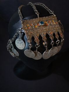 An original headdress of enameled silver with filigree and chain work of great age. Pieces like this are rare now in commerce. Ait Ouaouzguit. Bedouin Jewelry, Amazigh Jewelry, Moroccan Beauty, Tiaras And Crowns, Silver Enamel, Tiara, Morocco