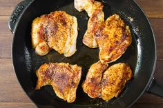 some chicken is cooking in a pan on top of the stove and it's ready to be cooked