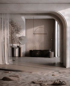 a large bathroom with an arch leading into the bathtub